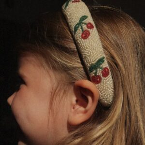 Konges Slojd Creme Cherry beaded hairbrace with decorative pearls.