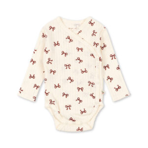 Konges Sløjd newborn body Minnie Pointelle in Bow Rouge made from GOTS-certified organic cotton with wrap closure